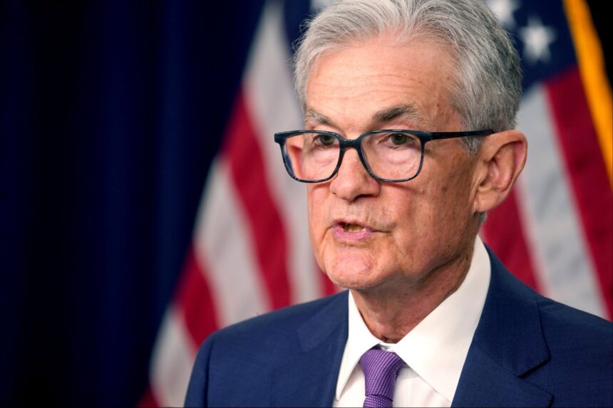 Fed Holds Interest Rates, Cuts Expected Through 2026